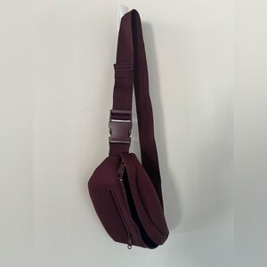 Dagne Dover belt bag in a beautiful wine color.
